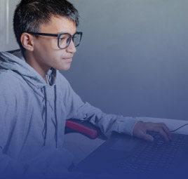 young kid working on a computer
